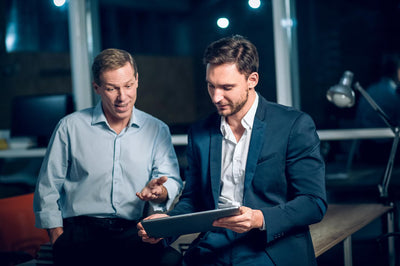 IT consultants talking ysing the digital touch screen